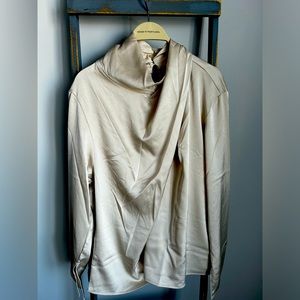 New with tags beige satin blouse.